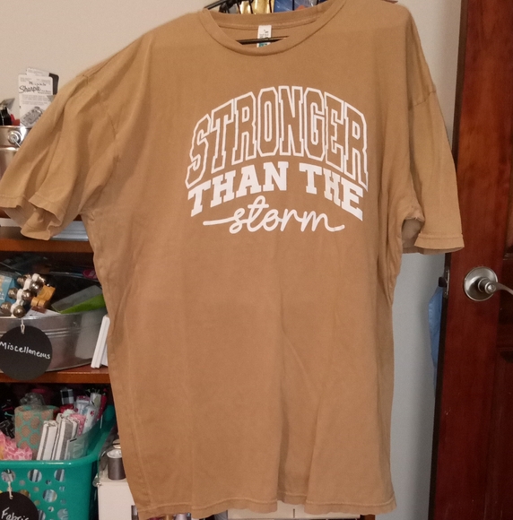 Stronger Than The Storm Tan Tee - Picture 2 of 6